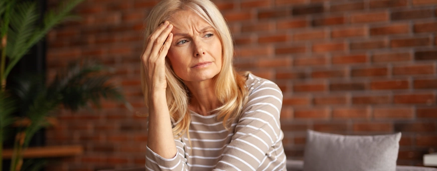 Life Assure Woman Thinking Seriously Staring In Distance Hero